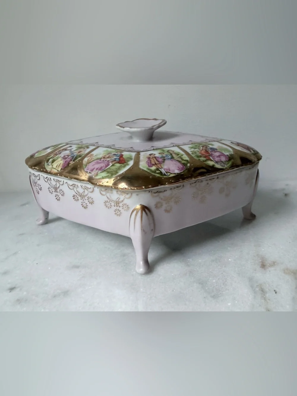 Ornate Footed Porcelain Box with Love Scenes